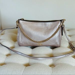 COACH rose gold cross body
